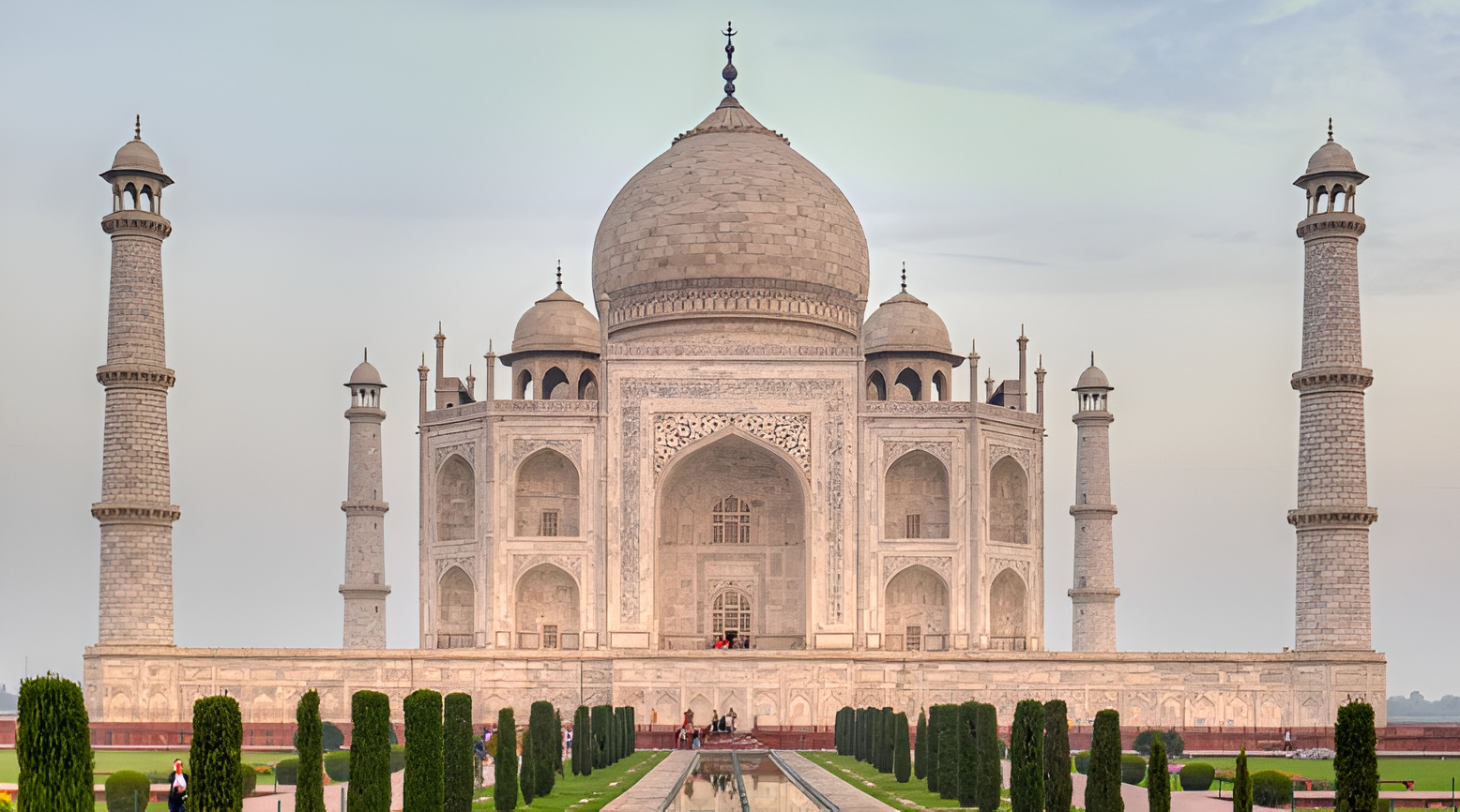 Taj Mahal white marble mausoleum with minarets